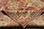 Folded back corner showing the hand-knotted reverse, knot density and cream weft of this Oushak