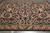 9 x 12 Chinese Aubusson rug viewed at an angle, ivory guard stripes and floral border