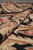 Fold detail showing the supple pliable handle of the hand woven wool with no pile height