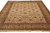 9'1" x 12' hand-knotted Indian wool rug photographed from above showing ivory field and palm tree border