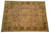 9' x 12' Indian Zigler rug photographed flat, symmetrical palmettes across a soft camel field