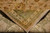 Folded corner revealing the back, hand-knotted wool pile density and fine knotting of the Zigler design