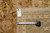 Back tag and tape measure documenting this genuine hand-woven Oriental rug, reference number F-5072