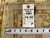 Back of the hand-knotted runner with inventory tag number 6801 and tape measure confirming size