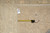 Tape measure and handwritten stock tag reading PK-257 laid on the rug's beige border