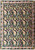 Black field English Garden needlepoint rug with gold acanthus scrolls, rose tulips and blue berries