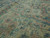 Low pile area revealing the cotton foundation and honest antique wear across the woven ground