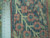 Ruler laid against the border showing the tight knots per square inch of this 8x11 rug