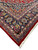 Corner detail showing ivory cotton fringe, red outer band and navy blue paisley main border