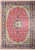 Full overhead view of red Persian Najafabad rug with navy floral border and ivory medallion