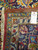 Back of the rug with cotton fringe, leather binding and genuine hand woven oriental rug tag