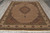 8x10 hand-knotted Mahi rug shown lengthwise, ivory fringe and cream main border clearly visible