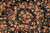 Macro of the field pattern: peach roses, coral lilies and grey green leaves without any medallion