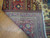 Back of the 10x13 Ardebil rug showing tight hand-knotting, cotton foundation and ivory fringe