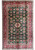 Full view of 8'4" x 12'3" green Super Kazak rug with ivory center medallion