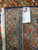 Reverse side showing tight hand-knotted weave, cotton foundation and rug tag number F-5008