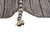 Folded edge showing plush half inch wool pile and hand-braided ivory charcoal side tassel