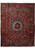 9'8" x 12'4" Persian Bakhtiar rug shown flat with navy medallion on rustic red field