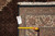 Back tag reading F-4468 size 8.2 x 10.1 beside tape measure on rug corner