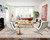 Neutral vintage Persian rug anchoring a bright white living room with Barcelona chairs and wood floors