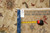 Back tag reading rug number F-4275 with tape measure confirming the 9'2" x 13' size