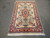 5' x 8' hand-knotted Tabriz rug from the 1980s in ivory, coral and blue