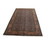 Navy and salmon Persian Ardebil wool rug displayed at an angle on white background