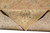 Folded corner reveals dense hand-knotted back and ivory main border with blue and rose accents