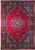 Full view of red Persian Tabriz rug with navy medallion, ivory vines and floral multi-border