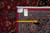 Back tag reading 9.10 x 12.8 beside tape measure documenting weave and cotton foundation