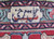 Woven signature cartouche in the top border of this signed Persian Tabriz wool rug