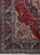8x11 Tabriz rug corner detail with navy main border, mint green guard stripes and floral spandrel