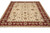 9 x 12 hand-knotted Agra rug angled view showing cream field and deep red border