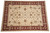 Overhead angle of the 9x12 Zigler design rug with sage green leaves on ivory ground