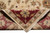 Folded back corner revealing dense wool pile, even knot rows and cotton fringe finish