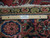 6'10" x 9'5" antique Heriz rug measured with ruler, showing knot density and intact wool fringe