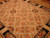 Angled view showing the all over floral lattice design and black panel border on parquet flooring