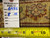 Back tag marked rug 6456 size 8 x 10 beside tape measure showing weave detail