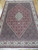 Navy and soft red Persian Bijar rug with Herati fish pattern and ivory palmette border