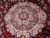 Macro of ivory and turquoise medallion rosette showing crisp high definition woven detail