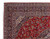 Corner detail of the indigo border with palmettes, vines and ivory guard stripes on wool pile