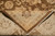 Back of the rug folded over the front, showing even knotting and cotton foundation