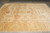 9'2" x 12' Ziegler Chobi Peshawar rug displayed flat on grey tile with gold border