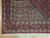 Corner detail showing boteh border, ivory guard stripes and dense wool pile of Bijar rug