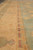 9' x 12'2" rug border detail, brick red bars set into the golden guard stripe