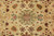 Field detail with ivory ground, olive palmette and repeating flower clusters in natural dyes