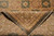 Folded corner revealing the back of the rug and its fine hand-knotted weave