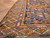 Border detail of the long hallway runner with reciprocal diamond guard stripes in gold, rose and ivory