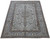 8'2 x 11'6 Persian Ardakan rug shown at an angle on a white studio floor