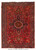 Full overhead view of 6'6" x 9'2" Persian Heriz rug with red field and navy medallion